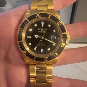 Invicta Men’s gold tone watch